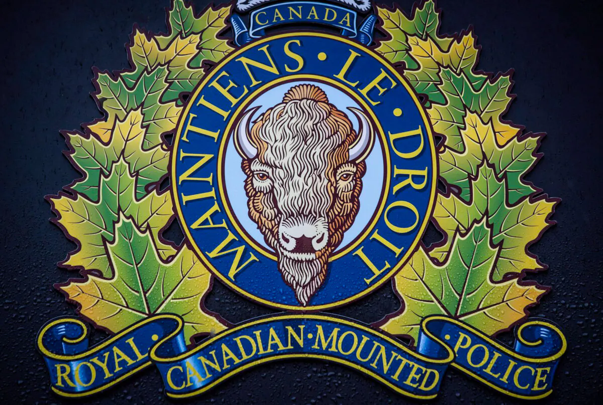 The RCMP logo is seen outside Royal Canadian Mounted Police "E" Division Headquarters, in Surrey, B.C., on April 13, 2018. (The Canadian Press/Darryl Dyck)