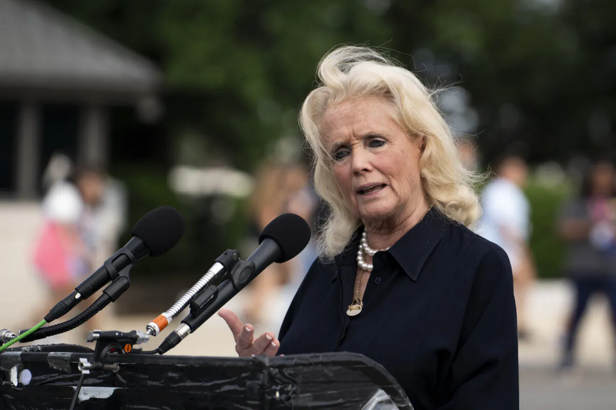Rep. Debbie Dingell (D-Mich.) and other lawmakers speak at a press briefing ahead of Dr. Anthony Fauci’s testimony before the Select Subcommittee on the Coronavirus Pandemic in Washington on June 3, 2024. (Madalina Vasiliu/The Epoch Times)