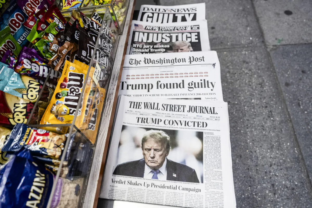 Newspapers are seen near Trump Tower prior to a press conference by former U.S. President Donald Trump in New York City on May 31, 2024. (Stephanie Keith/Getty Images)