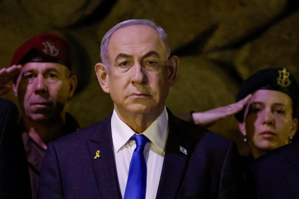 Israeli Prime Minister Benjamin Netanyahu, front, attends a wreath-laying ceremony marking Holocaust Remembrance Day in the Hall of Remembrance at Yad Vashem, the World Holocaust Remembrance Centre, in Jerusalem, Israel, on May 6, 2024. (Amir Cohen/Pool Photo via AP)