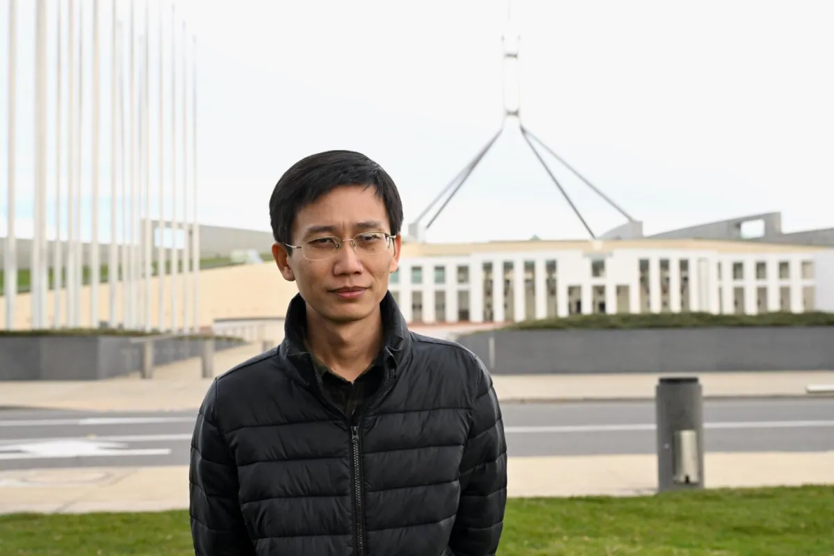Eric, a former Chinese spy who defected from China’s Ministry of Public Security speaks to the media outside Parliament House in Canberra, Australia, on June 4, 2024. (AAP Image/Lukas Coch)