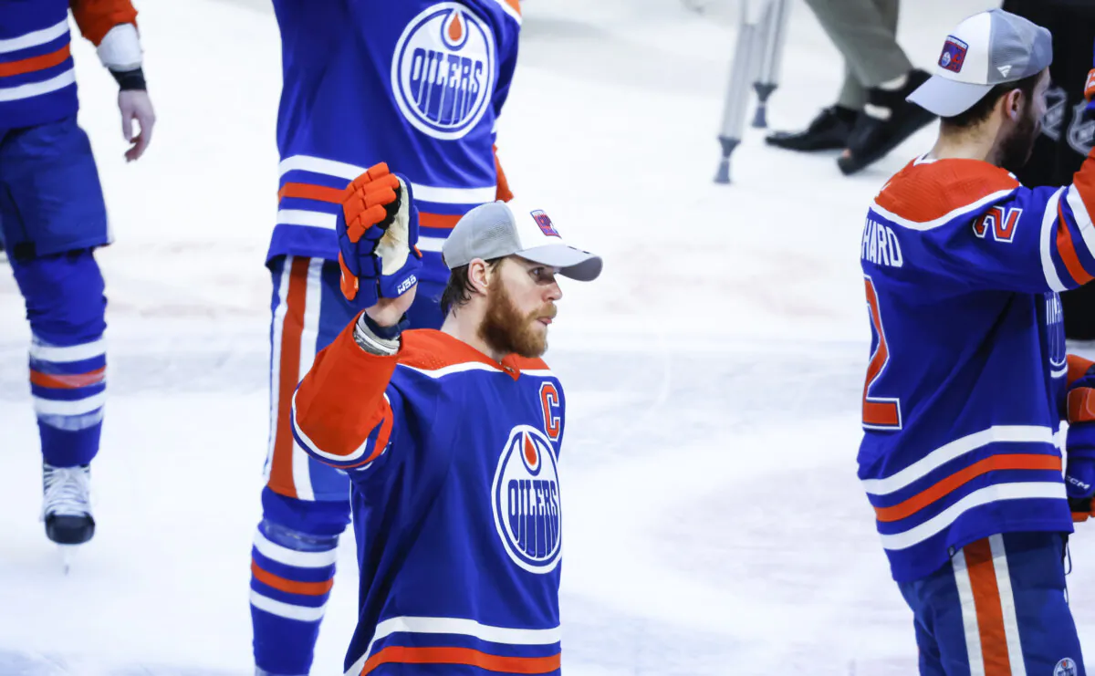 Edmonton Oilers forward Connor McDavid (#97) and his teammates wave to fans after defeating the Dallas Stars in Game 6 of the Western Conference in Edmonton on June 2, 2024. (The Canadian Press/Jeff McIntosh)