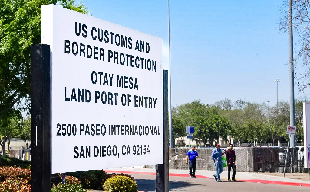 People enter the US at the Otay Mesa port of entry at the US-Mexico border in San Diego, California on June 8, 2019. (Frederic J. Brown/AFP via Getty Images)