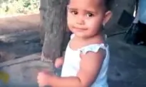 Baby Dances Alone to Music
