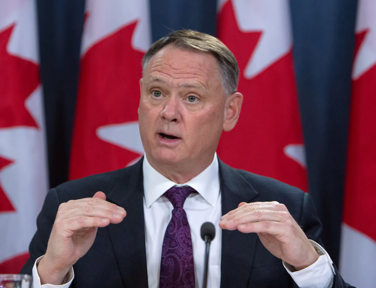 David McGuinty, chair of the National Security and Intelligence Committee of Parliamentarians, holds a news conference to release the committee's annual report, in Ottawa on March 12, 2020. (Fred Chartrand/The Canadian Press)