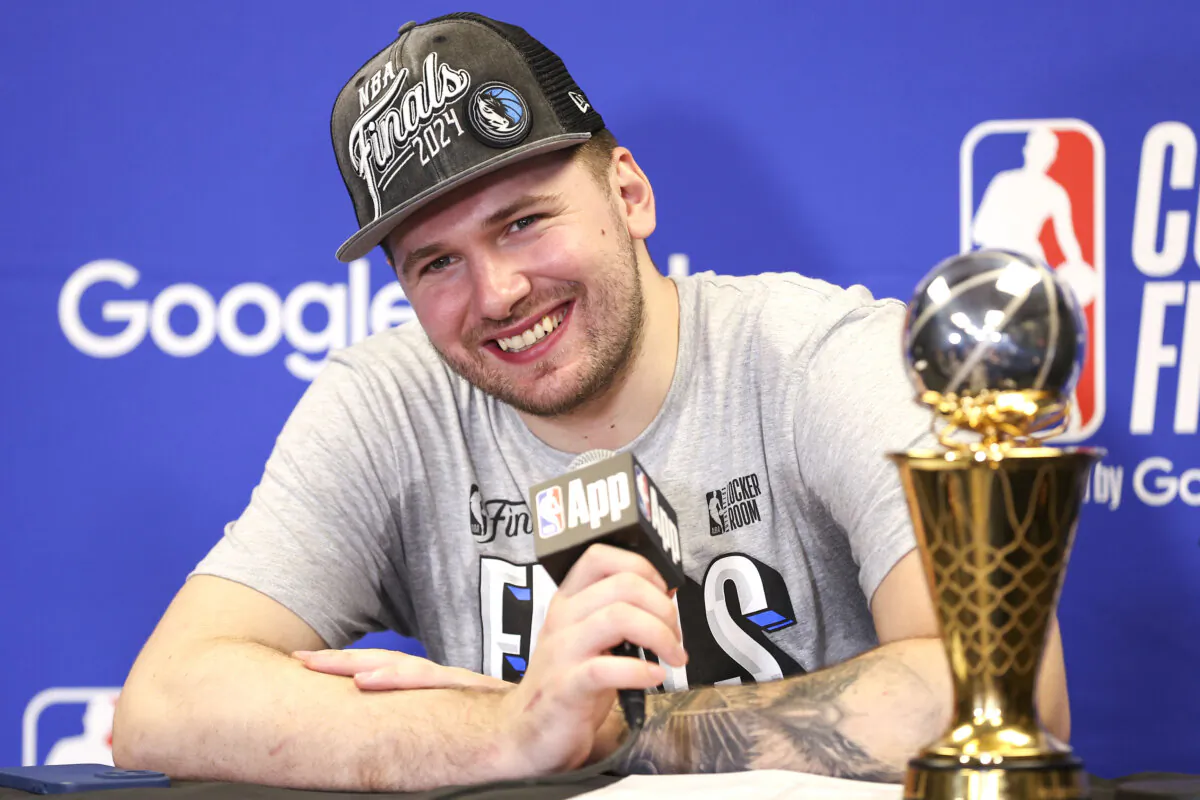 Dallas Mavericks guard Luka Doncic smiles during a news conference after the team's win over the Minnesota Timberwolves in Game 5 of the NBA basketball Western Conference finals in Minneapolis on May 30, 2024. (Matt Krohn/AP Photo)