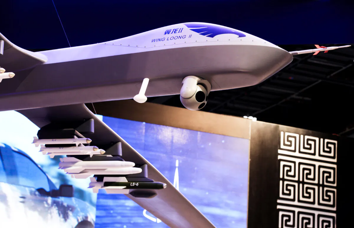 A model of the Wing Loong II weaponized drone for the China National Aero-Technology Import & Export Corp. is displayed at a military drone conference in Abu Dhabi, United Arab Emirates, on Feb. 25, 2018. (Jon Gambrell/AP)