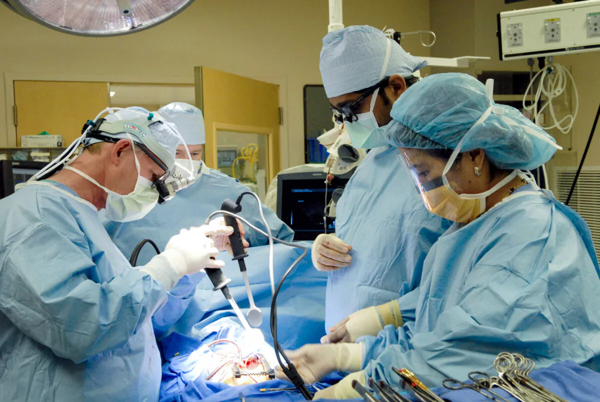 Doctors perform open heart surgery on a young patient at Children's Hospital in Los Angeles, Calif., on March 24, 2008. (Bob Riha, Jr./Children's Hospital Los Angeles via Getty Images)