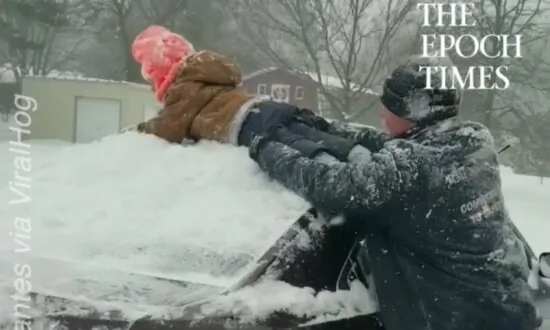 Dad Uses Son to Clean Snow Off Car