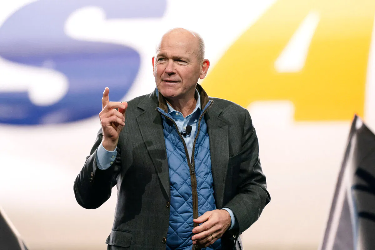 Dave Calhoun, then-CEO of Boeing, speaks onstage during the delivery of the final 747 jet at the company's plant in Everett, Wash., on Jan. 31, 2023. (David Ryder/Reuters)