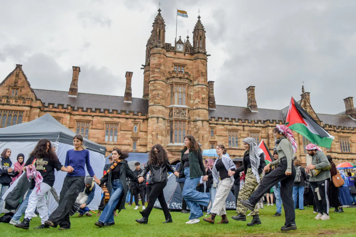 Protesters shout slogans at the Palestinian Protest Campsite at University of Sydney in Sydney, Australia, on May 3, 2024. (Ayush Kumar/AFP via Getty Images)