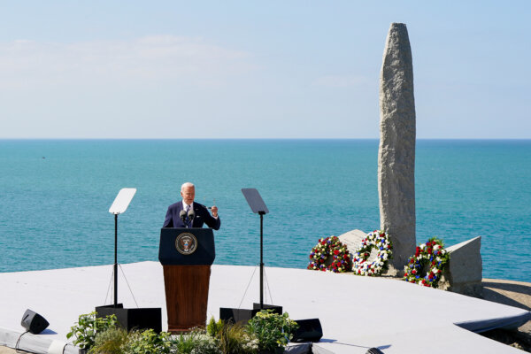 Biden Calls for Upholding Democracy in Normandy Cliff Speech