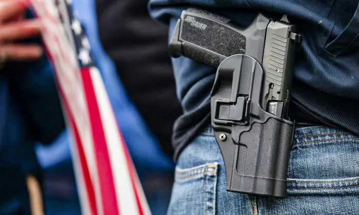A handgun in a holster in a file photo. (David Ryder /Getty Images)