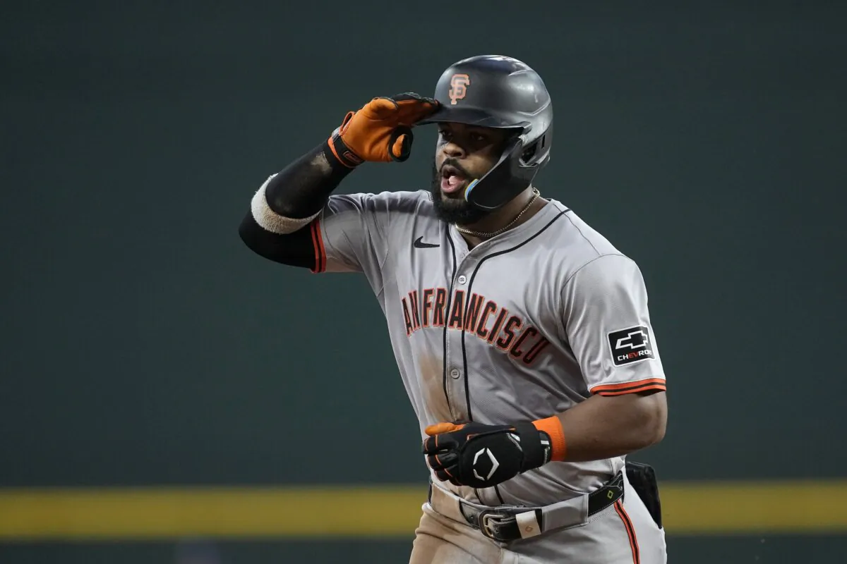 San Francisco Giants' Heliot Ramos celebrates his two-run home run against the Texas Rangers in the third inning of a baseball game in Arlington, Texas, on June 8, 2024. (Tony Gutierrez/AP Photo)