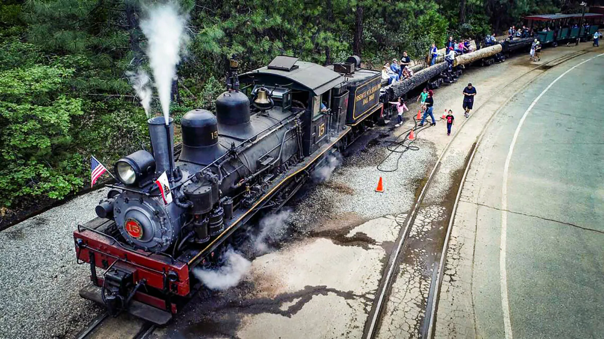 Passengers board before the No. 15 Shay locomotive before departs for a Yosemite Mountain Sugar Pine Railroad "moonlight special" excursion through the Sierra National Forest on June 6, 2019. (Craig Kohlruss/The Fresno Bee/TNS)