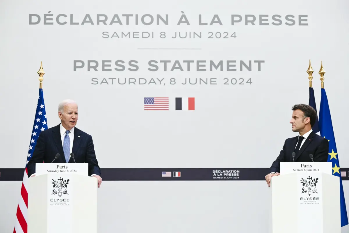 U.S. President Joe Biden (L) and French President Emmanuel Macron address the media during press statements following a bilateral meeting as part of President Biden's state visit to France, at the Presidential Elysee Palace in Paris on June 8, 2024. (Saul Loeb/AFP)