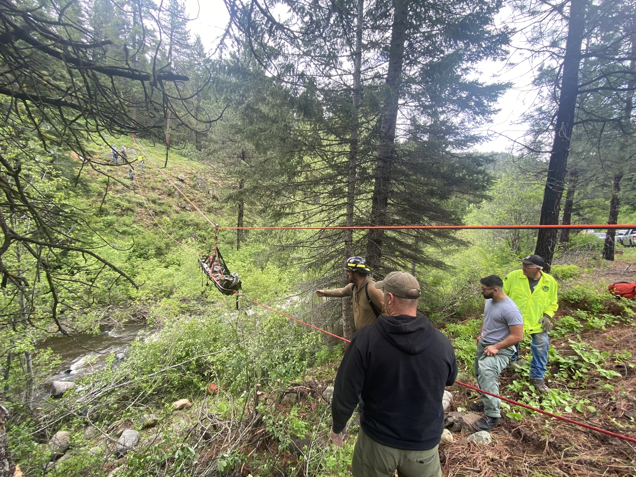 Various team members worked to rescue Mr. Garrett. 