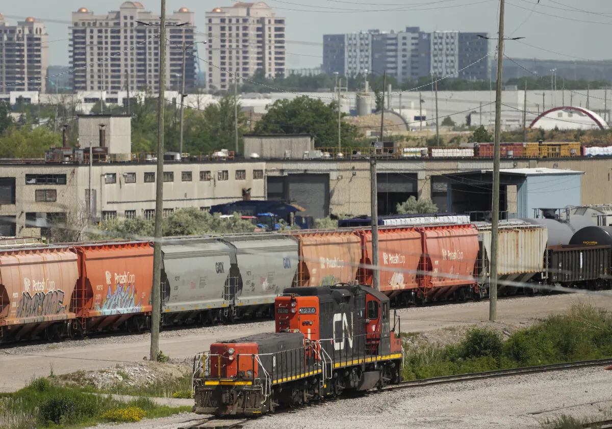 CN rail trains are shown at the CN MacMillan Yard in Vaughan, Ont., on June 20, 2022. (The Canadian Press/Nathan Denette)