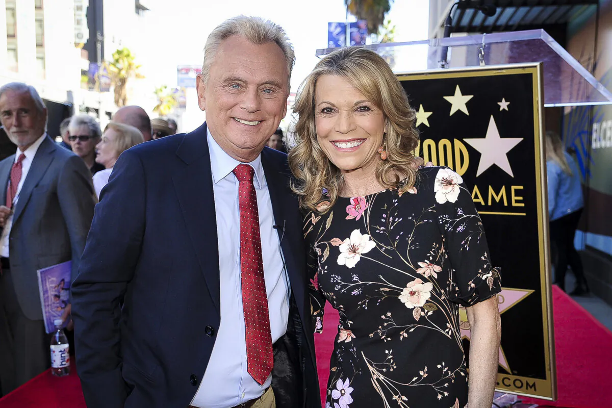 Pat Sajak (L) and Vanna White from "Wheel of Fortune" attend a ceremony honoring Harry Friedman with a star on the Hollywood Walk of Fame in Los Angeles on Nov. 1, 2019. (Richard Shotwell/Invision/AP)