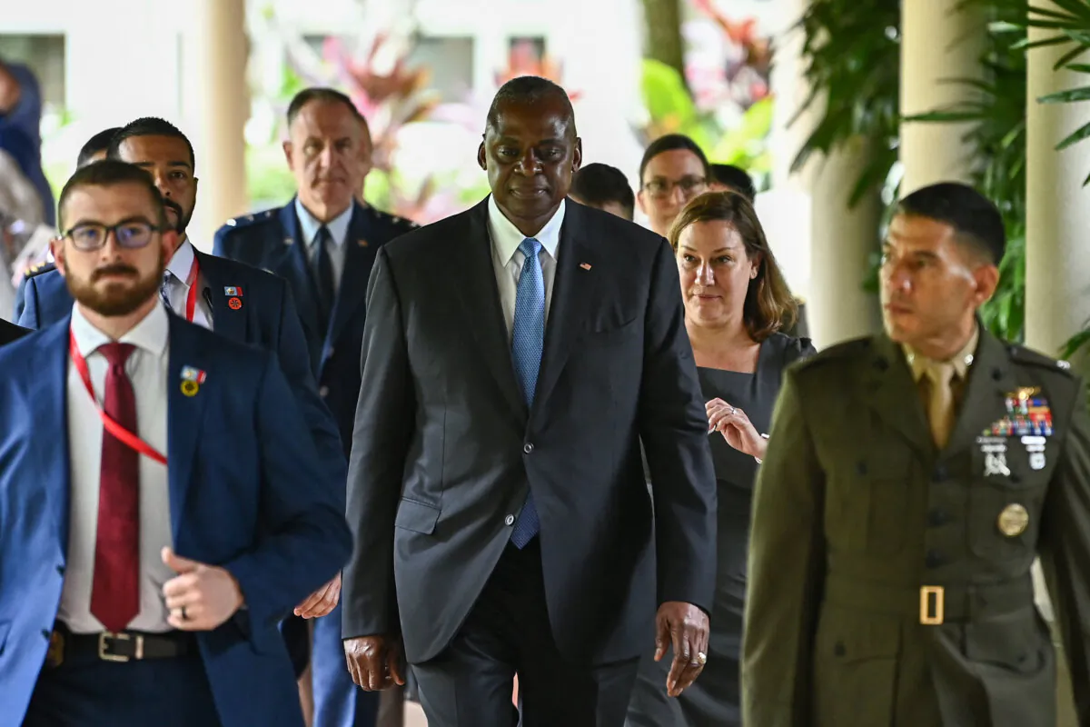 US Secretary of Defence Lloyd Austin (C) walks out after a bilateral meeting with China's Defence Minister Dong Jun on the sidelines of the 21st Shangri-La Dialogue summit at the Shangri-La Hotel in Singapore on May 31, 2024. (Nhac Nguyen/AFP via Getty Images)