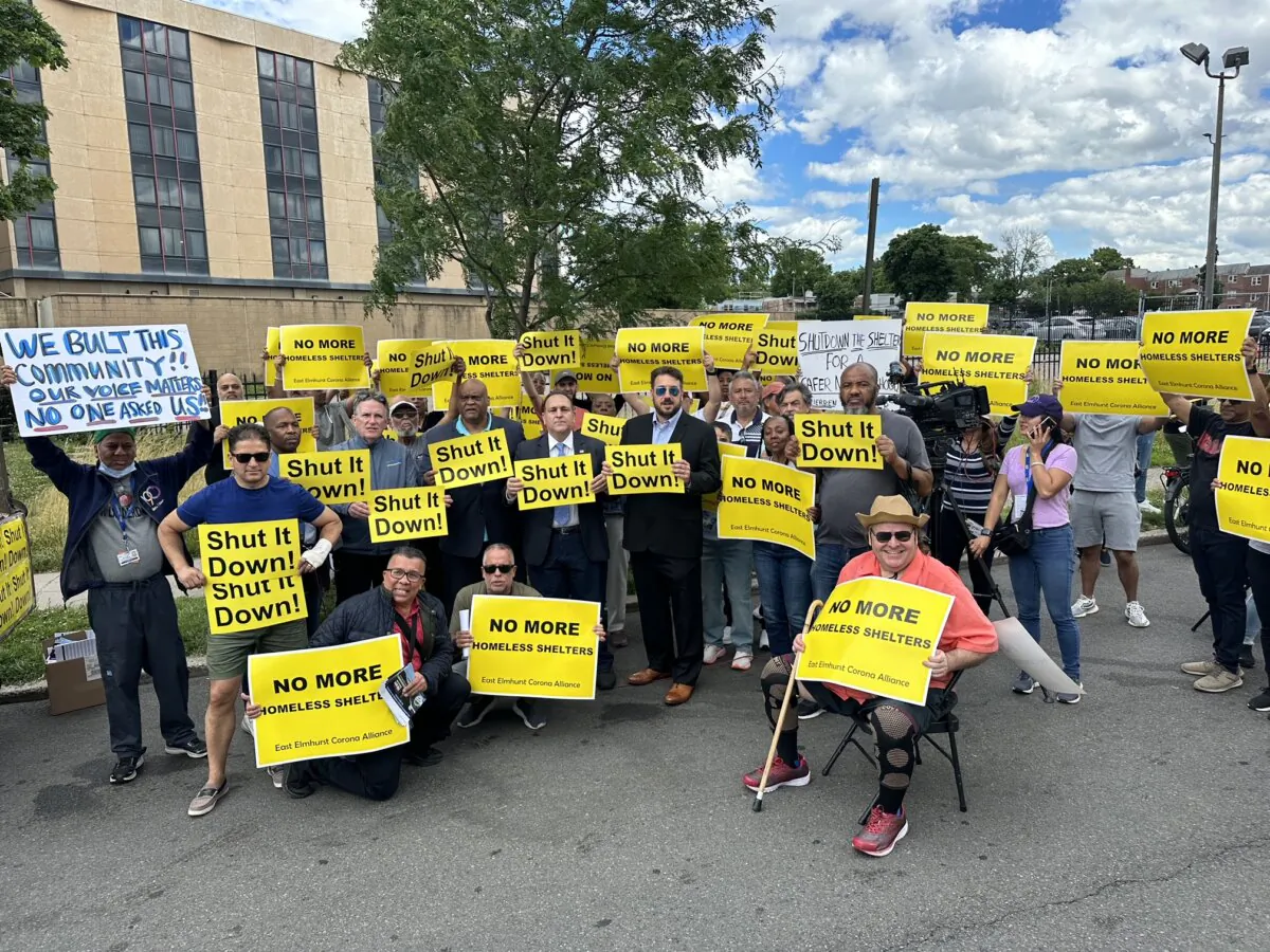 Residents of the East Elmhurst neighborhood protest outside a former Courtyard Marriott hotel, converted to house illegal immigrants, in Queens, N.Y., on June 9, 2024. (Hiram Monserrate)
