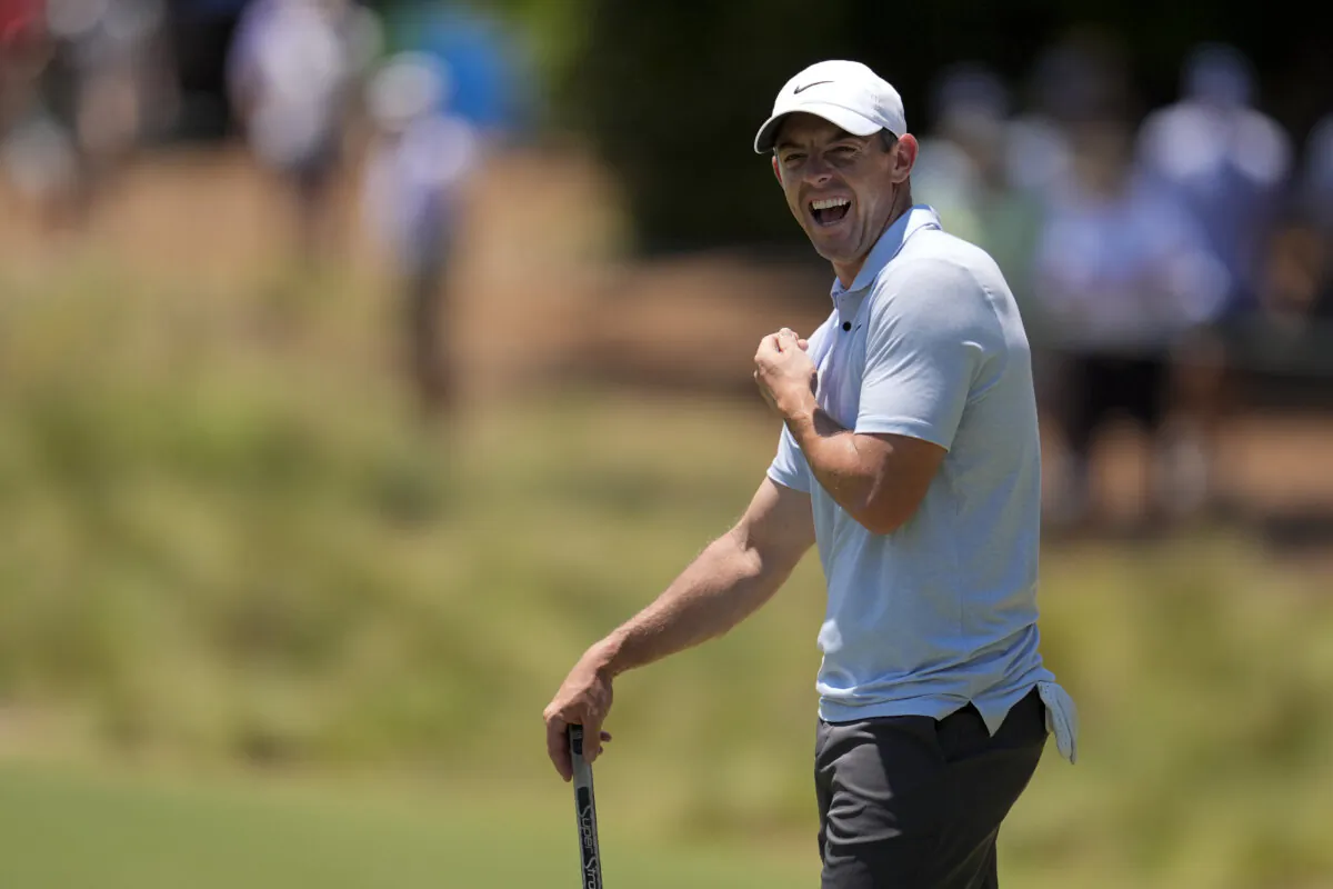 Rory McIlroy of Northern Ireland smiles on the first hole during a practice round for the U.S. Open golf tournament in Pinehurst, N.C., on June 11, 2024. (George Walker IV/AP Photo)