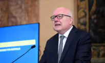Ex-Attorney General Warns Against Public Indifference Towards Global Conflict