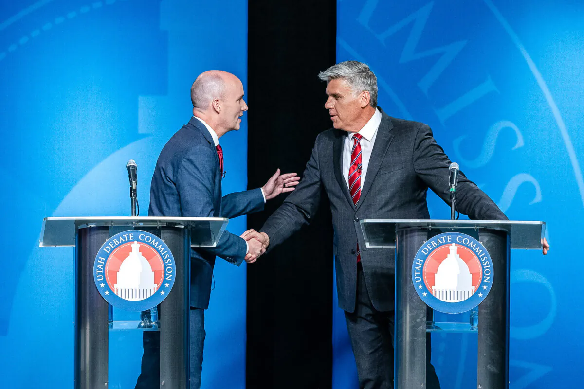 Incumbent Gov. Spencer Cox, left, shakes hands with Utah Rep. Phil Lyman after Utah's gubernatorial GOP primary debate in Salt Lake City on June 11, 2024. (Isaac Hale/The Deseret News via AP, Pool)