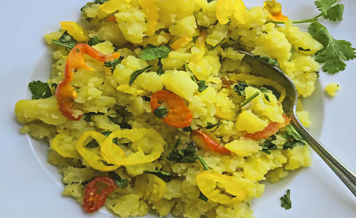 This potato salad recipe from Michael Solomonov's cookbook "Zahav" is made with pickled peppers and cilantro. (Gretchen McKay/Pittsburgh Post-Gazette/TNS)