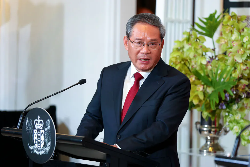 Chinese Premier Li Qiang speaks during a press conference with New Zealand Prime Minister Christopher Luxon (not pictured) at Government House in Wellington, New Zealand, on June 13, 2024. (Photo by Hagen Hopkins/Getty Images)
