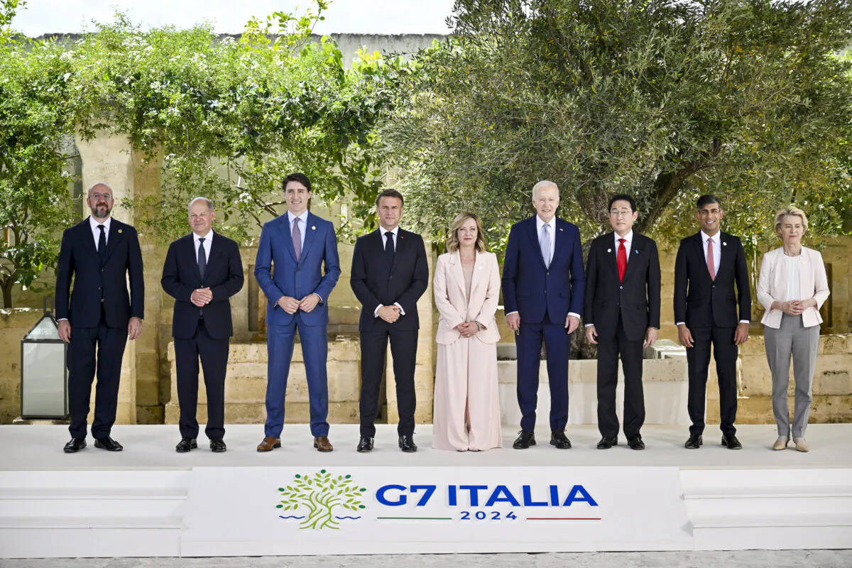 (L-R) European Council President Charles Michel, German Chancellor Olaf Scholz, Canadian Prime Minister Justin Trudeau, French President Emmanuel Macron, Italian Prime Minister Giorgia Meloni, U.S. President Joe Biden, Japanese Prime Minister Fumio Kishida, British Prime Minister Rishi Sunak and European Commission President Ursula von der Leyen pose for a family photo during a welcome ceremony on day one of the 50th G7 summit at Borgo Egnazia on June 13, 2024 in Fasano, Italy. (Antonio Masiello/Getty Images)