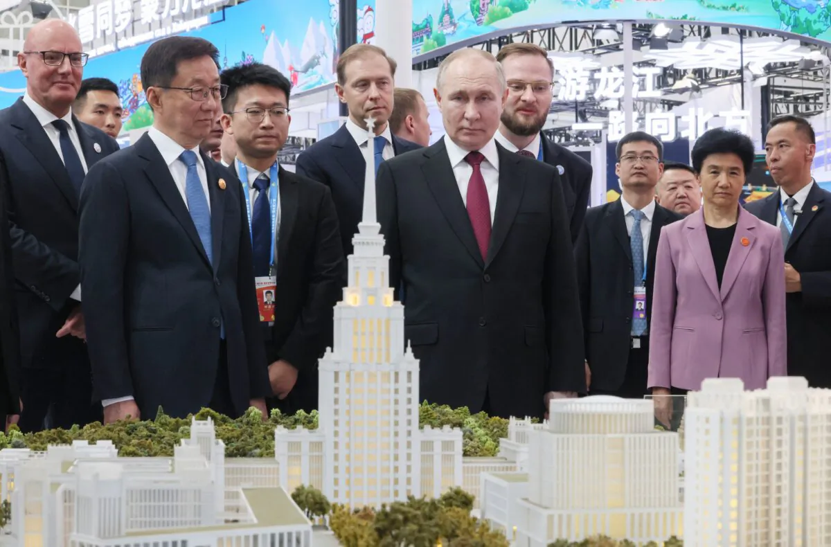 Russia's President Vladimir Putin tours a Russia-China trade expo in the northeastern city of Harbin on May 17, 2024. (Mikhail Metzel / POOL / AFP via Getty Images)