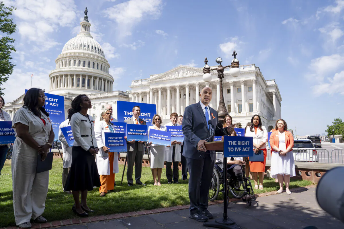 Sen. Cory Booker (D-N.J.) speaks during a news conference about the IVF Act in Washington on June 12, 2024. (Madalina Vasiliu/The Epoch Times)