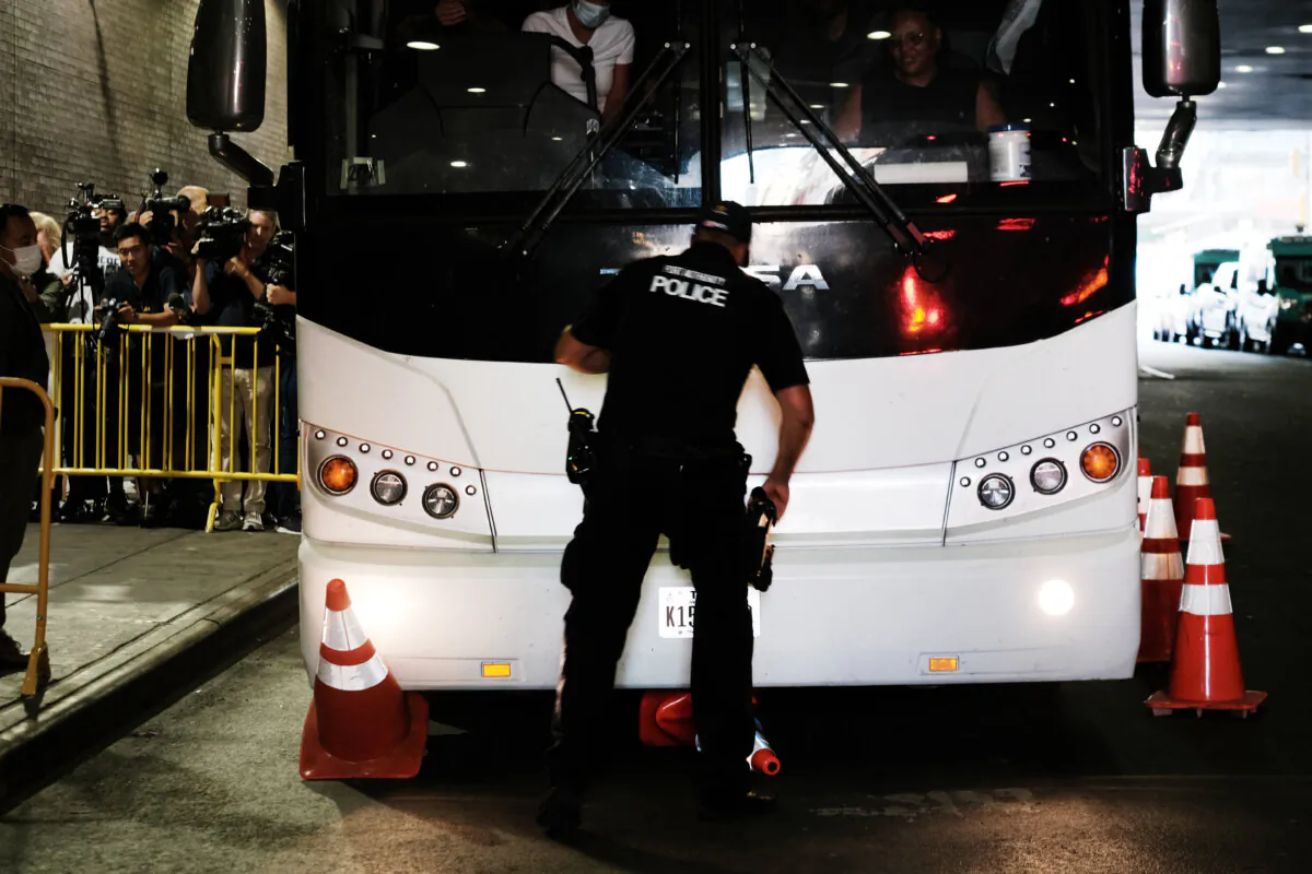 A bus pulls into the Port Authority bus station in Manhattan on August 25, 2022 in New York City. (Spencer Platt/Getty Images)