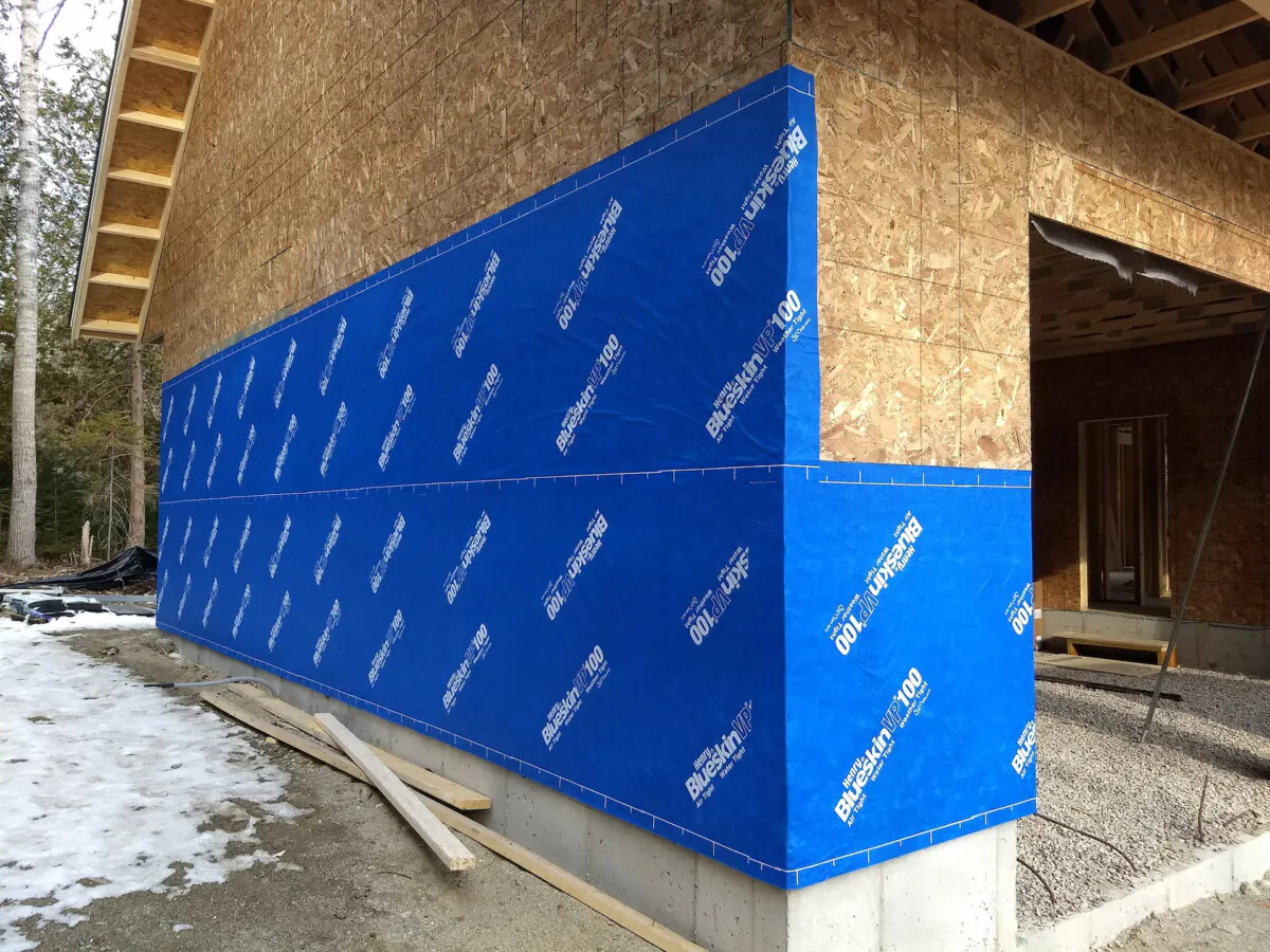This blue wrap is designed to prevent wood rot on a wood-framed house. It has its own adhesive backing and will adhere to clean and dry wood sheathing. (Tim Carter/Tribune Content Agency/TNS)