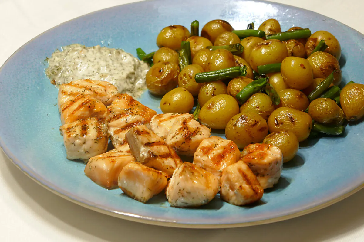 Salmon Kebabs with Dill Tartar Sauce and New Potatoes with Green Beans. (Linda Gassenheimer/TNS)