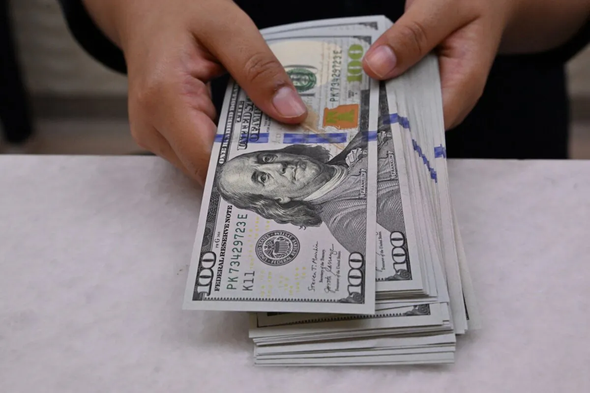 Money in a file image. (Adek Berry/AFP via Getty Images)