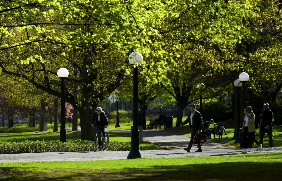 People make their way through Confederation Park in downtown Ottawa on May 10, 2024. (The Canadian Press/Sean Kilpatrick)