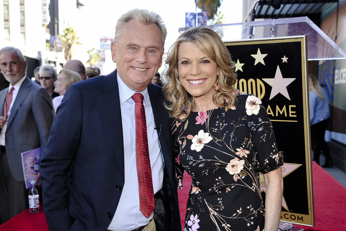 Pat Sajak (L) and Vanna White from "Wheel of Fortune" attend a ceremony honoring Harry Friedman with a star on the Hollywood Walk of Fame in Los Angeles on Nov. 1, 2019. (Richard Shotwell/Invision/AP)