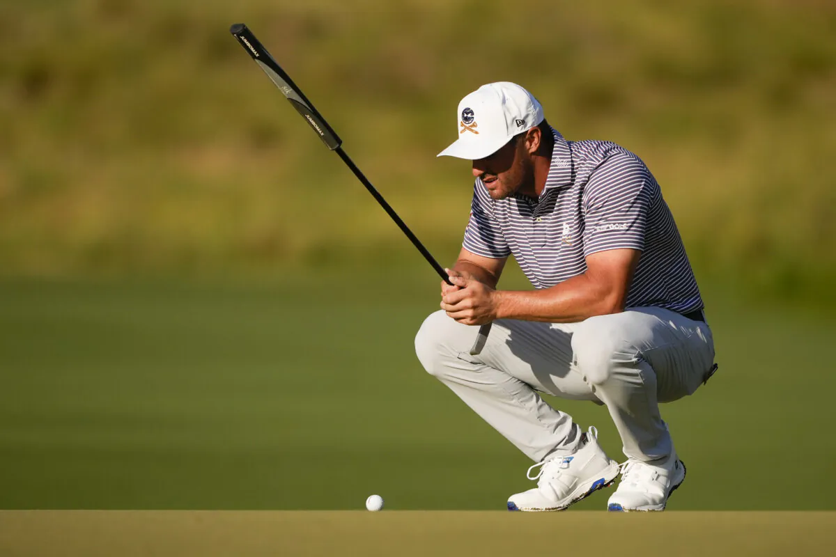 Bryson DeChambeau lines up a putt on the first hole during the second round of the U.S. Open golf tournament in Pinehurst, N.C., on June 14, 2024. (Matt York/AP Photo)