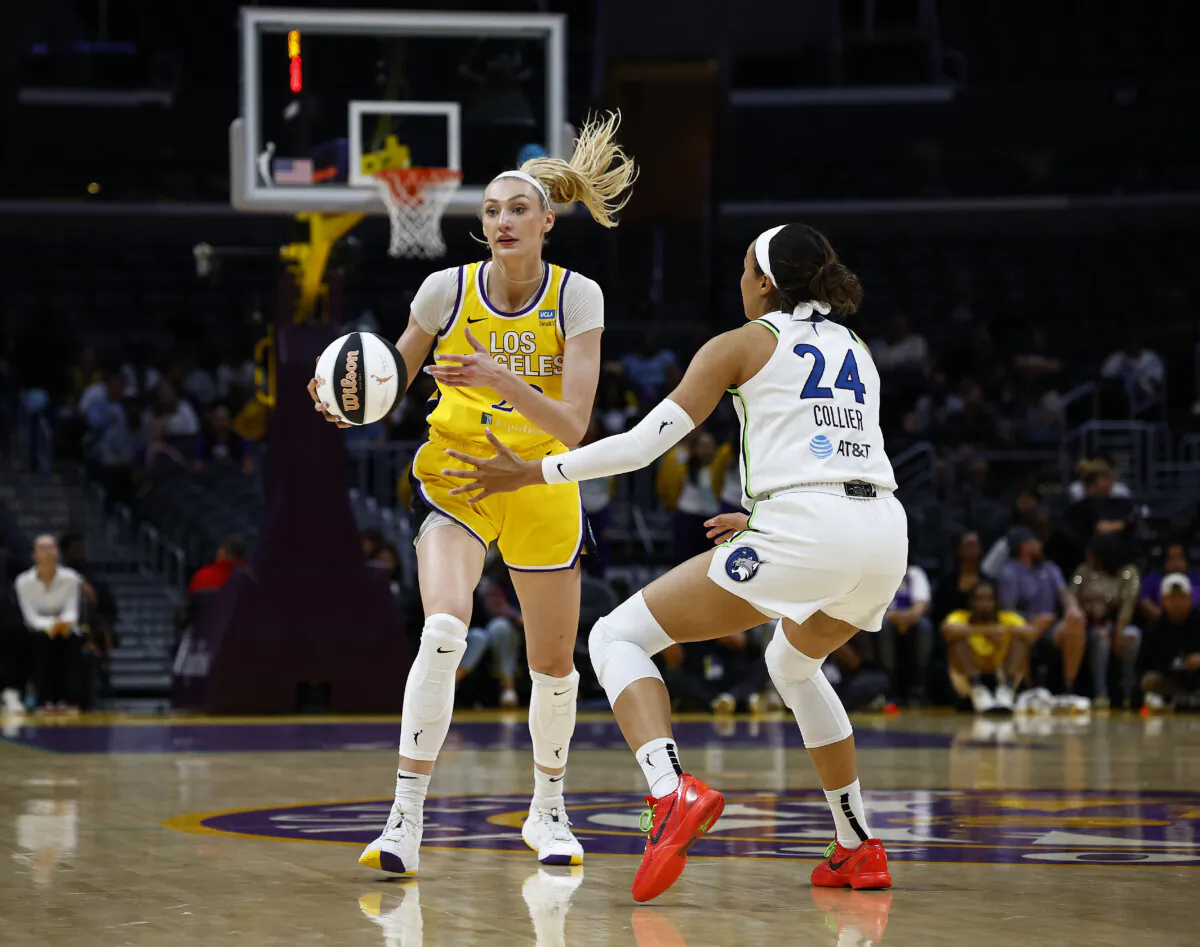 Cameron Brink (22) of the Los Angeles Sparks and Napheesa Collier (24) of the Minnesota Lynx in Los Angeles on June 5, 2024.  (Ronald Martinez/Getty Images)