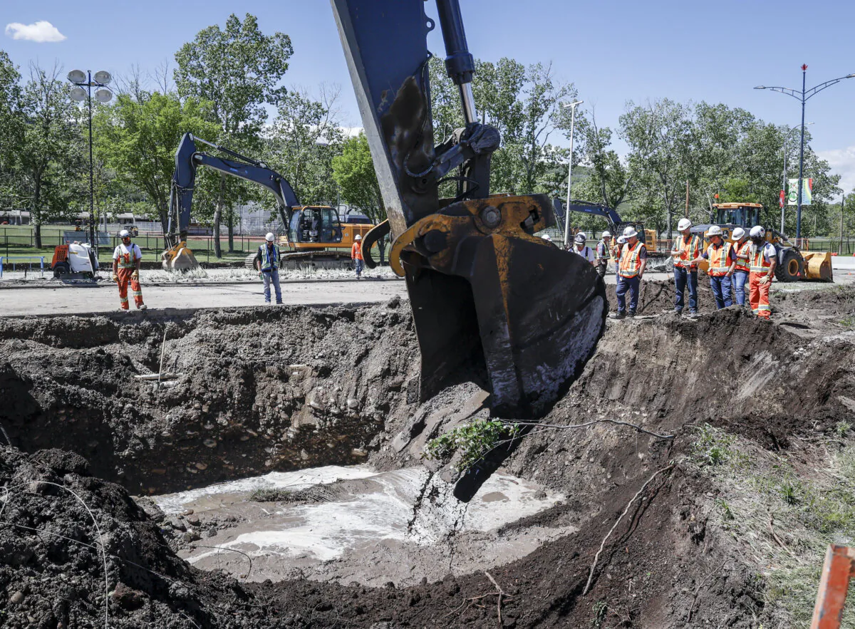 Work to repair a major water main in Calgary continues on June 7, 2024. The City Calgary announced on June 14, 2024, that water restrictions could last another 3 to 5 weeks as additional repairs are needed. (The Canadian Press/Jeff McIntosh)

