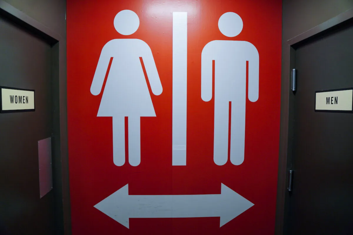 A sign outside restrooms in Chattanooga, Tenn., on Jan. 13, 2023. (Jackson Elliott/The Epoch Times)