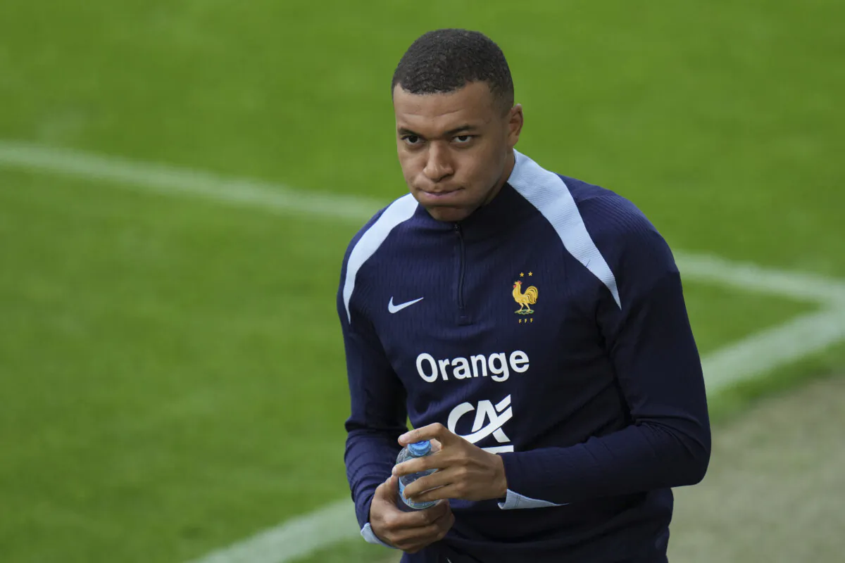 France's Kylian Mbappe gestures during a training session in Paderborn, Germany on June 13, 2024. (Hassan Ammar/AP Photo)