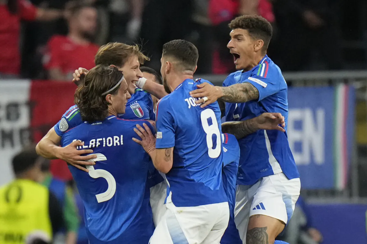 Italy's Nicolo Barella (2nd L) celebrates with his teammates after scoring his side's second goal during a Group B match between Italy and Albania at the Euro 2024 soccer tournament in Dortmund, Germany, on June 15, 2024. (Alessandra Tarantino/AP Photo)
