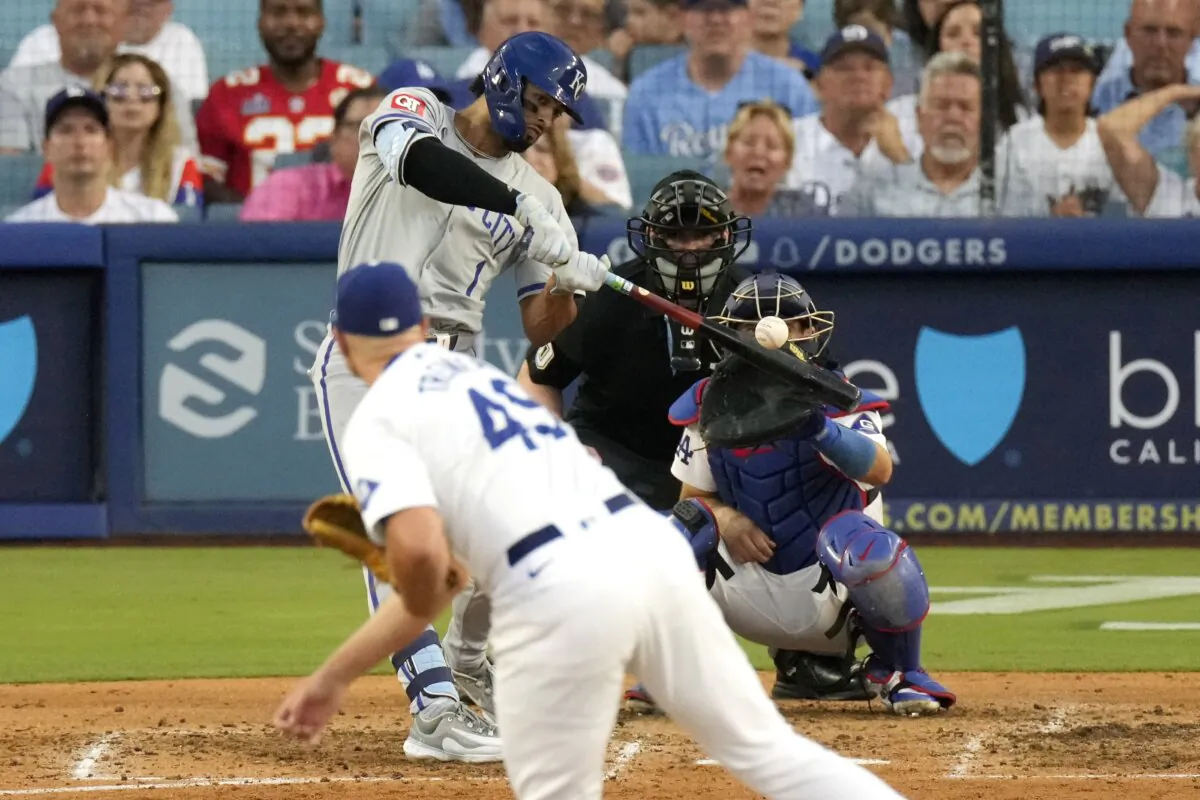 Kansas City Royals' MJ Melendez (Top Left) hits a grand slam as Los Angeles Dodgers relief pitcher Blake Treinen (Lower Left) and catcher Austin Barnes (R) watch along with home plate umpire John Bacon during the sixth inning of a baseball game in Los Angeles on June 15, 2024. (Mark J. Terrill/AP Photo)