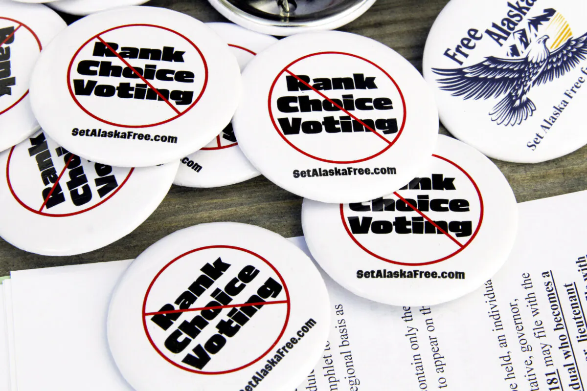Campaign buttons urging Alaskans to repeal ranked-choice voting sit on a picnic table at the home of Phil Izon, a backer of the initiative, in Wasilla, Alaska, on May 14, 2014. (Mark Thiessen/AP Photo)