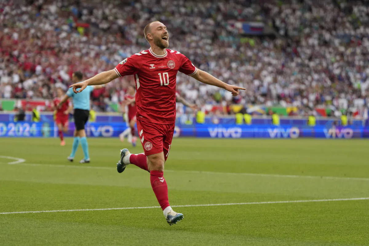 Denmark's Christian Eriksen celebrates after scoring the opening goal of the game during a Group C match between Slovenia and Denmark at the Euro 2024 soccer tournament in Stuttgart, Germany, on June 16, 2024. (Matthias Schrader/AP Photo)