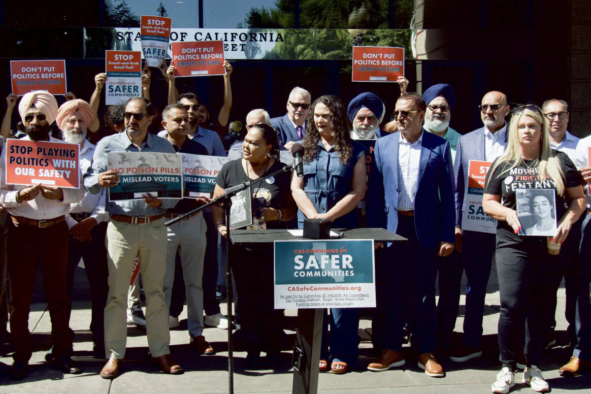 Proponents of the Homelessness, Drug Addiction, and Theft Reduction Act gather in front of the attorney general's office in Sacramento, Calif., on June 12, 2024. (Travis Gillmore/The Epoch Times)
