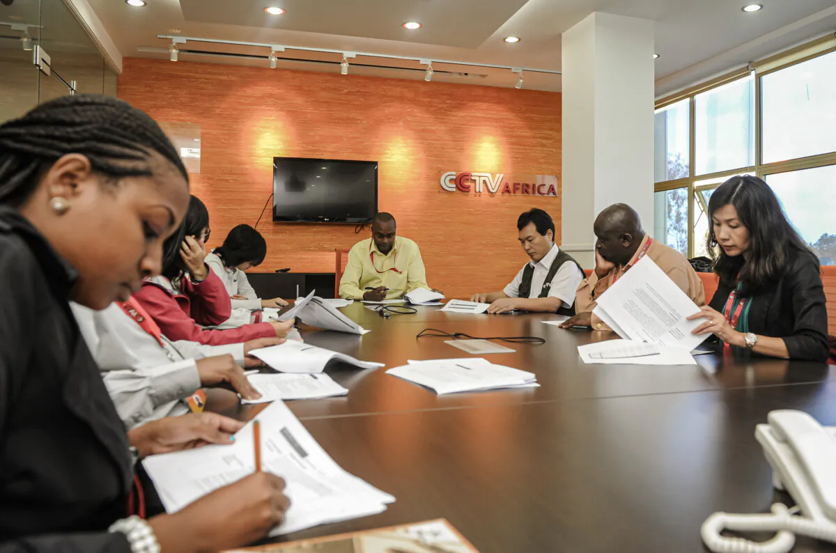 China Central Television Africa's journalists attend an editorial meeting in the premises of the television in Nairobi, Kenya, on June 12, 2012. (Simon Maina/AFP/GettyImages)